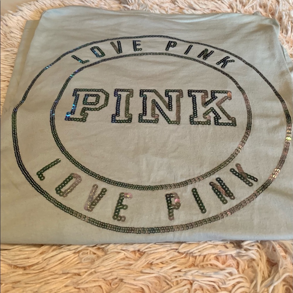Woman’s pink long sleeve tee size medium